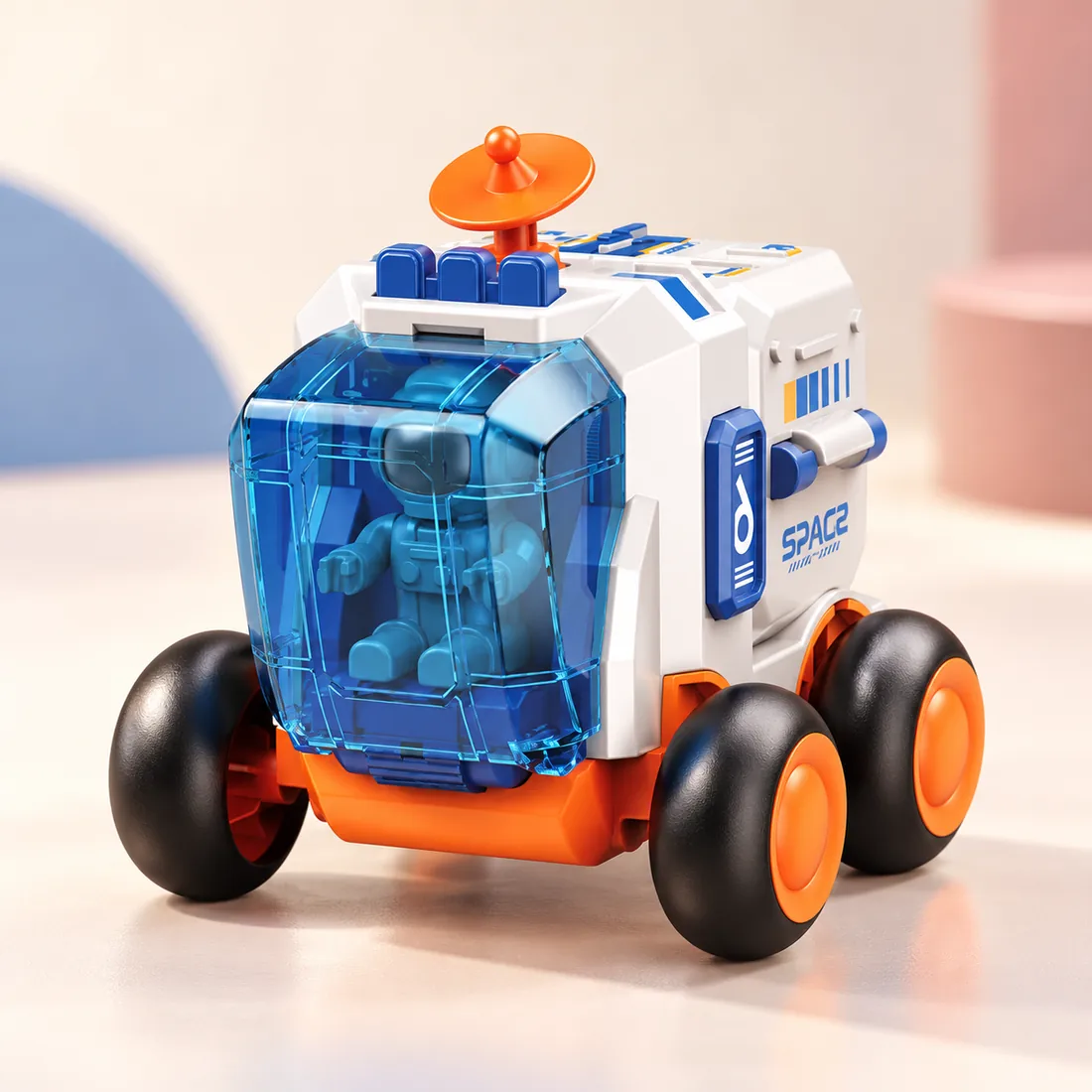 The moon rover in orange and blue with a clear cab
