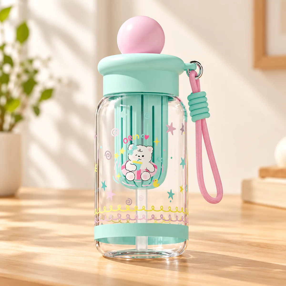 The Swimming Bear design - mint lid, pink ball, a bear with a drink on the straw sleeve