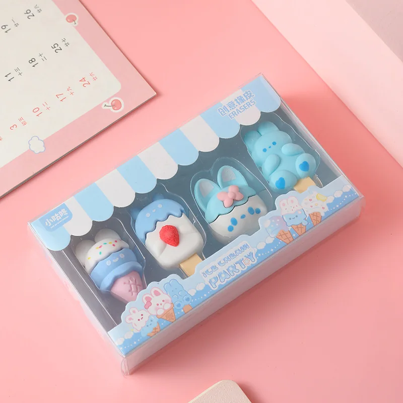 Blue Bunny set — sprinkle cone, strawberry lolly, bunny-ear lolly with a pink bow and a blue bunny, boxed behind a striped stand front