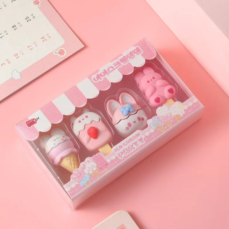 Pink Bunny set — sprinkle cone, strawberry lolly, bunny-ear lolly with a blue bow and a pink bunny, boxed behind a striped stand front