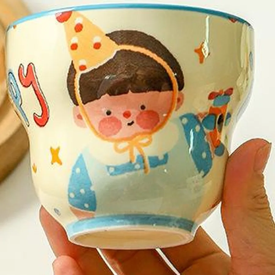 Blue-rim cartoon mug