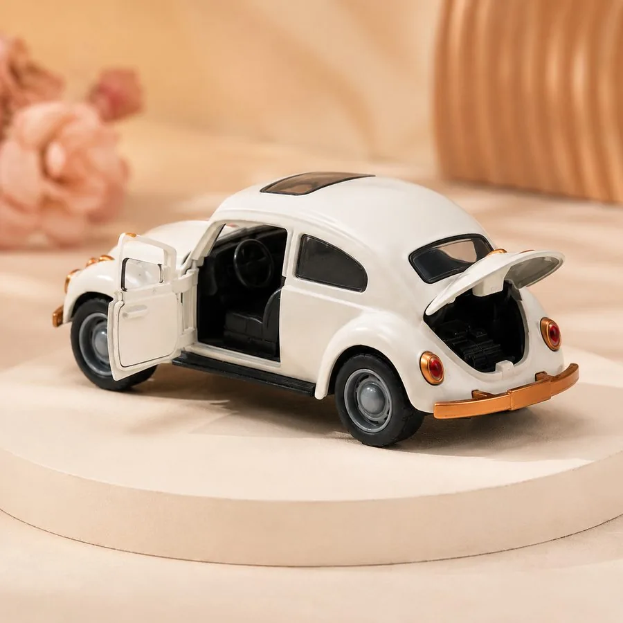 Cream Beetle alloy car, front view
