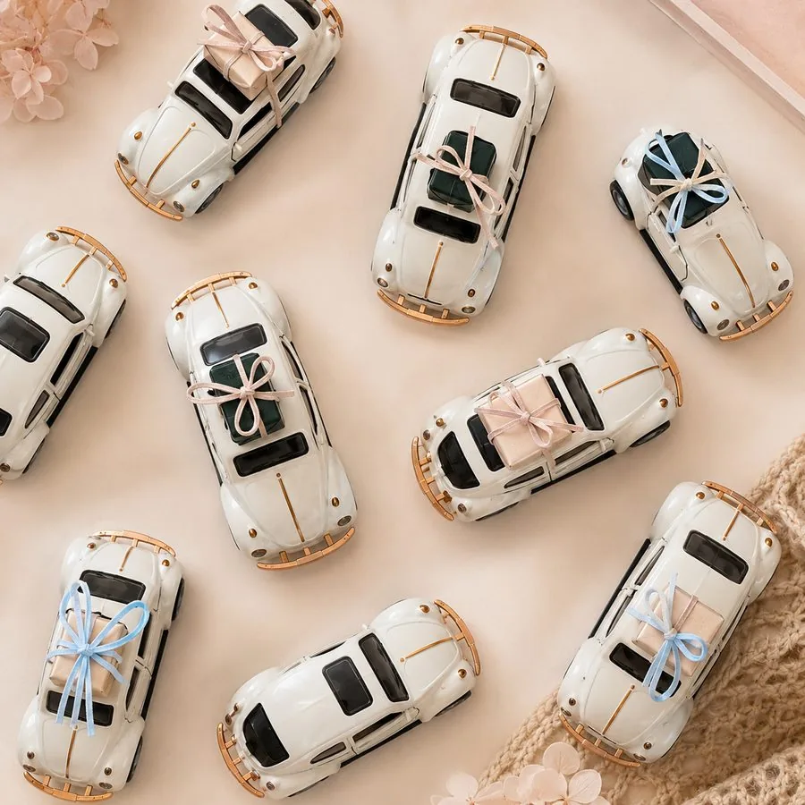 Beetle favours with gift box on the roof