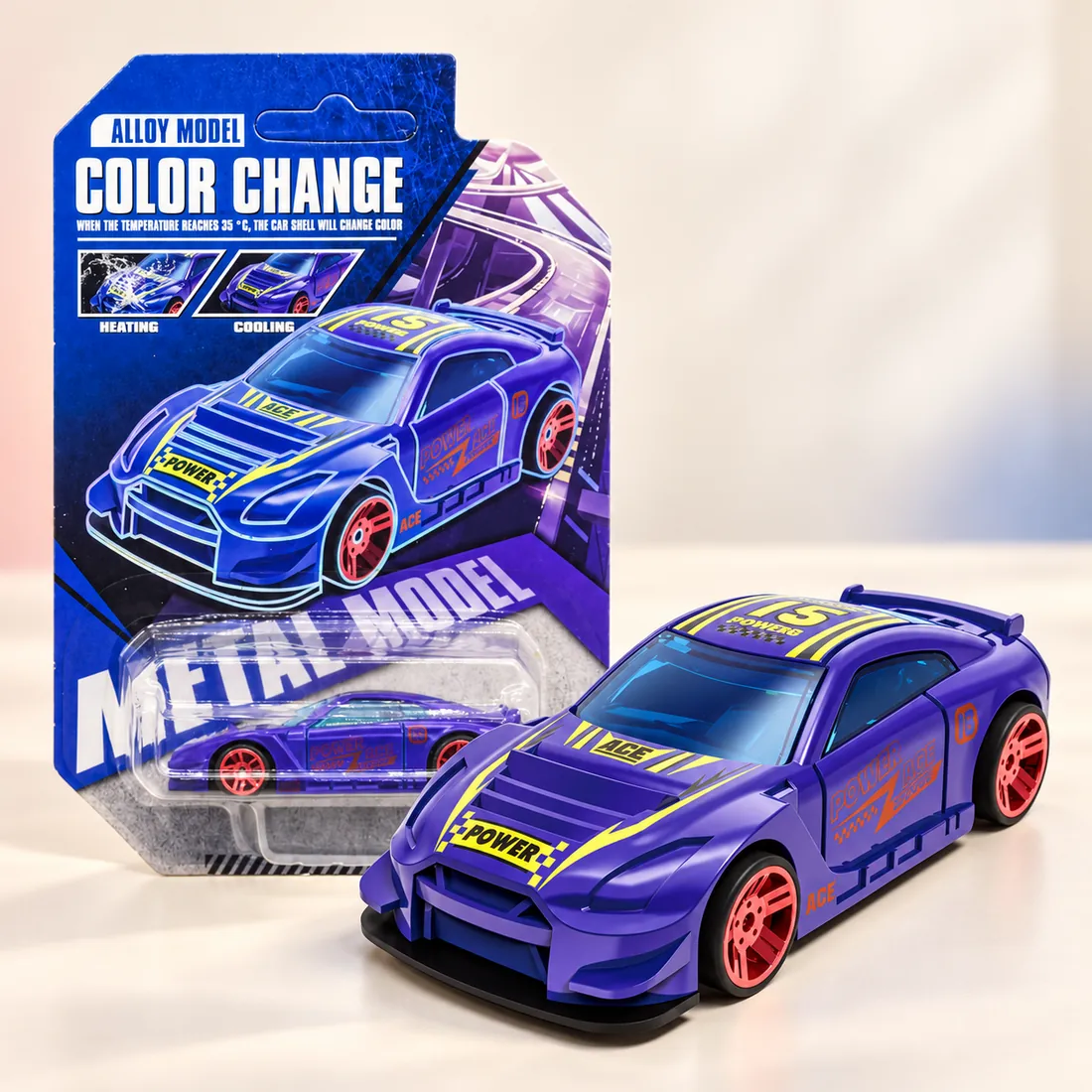 A purple die-cast racer on its display base beside the printed blister card showing the heating and cooling panels