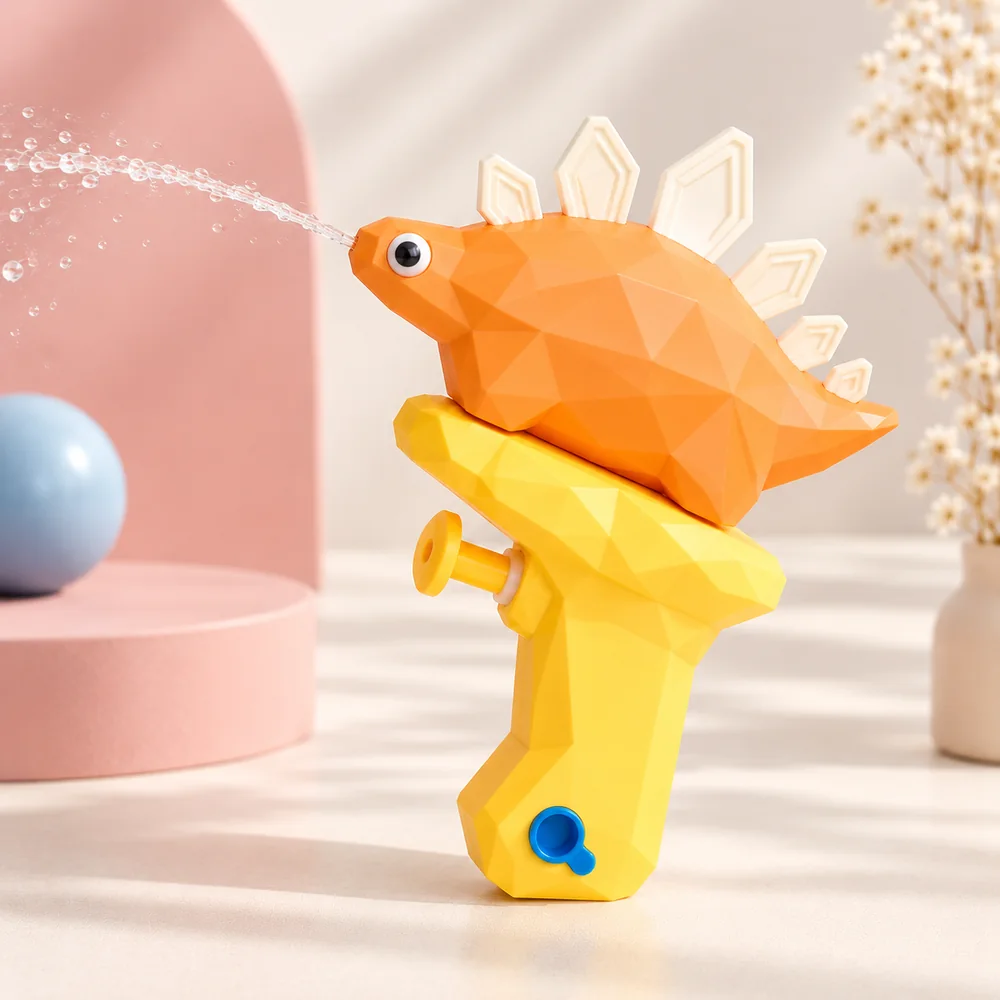 The orange stegosaurus squirter firing a jet of water from its mouth