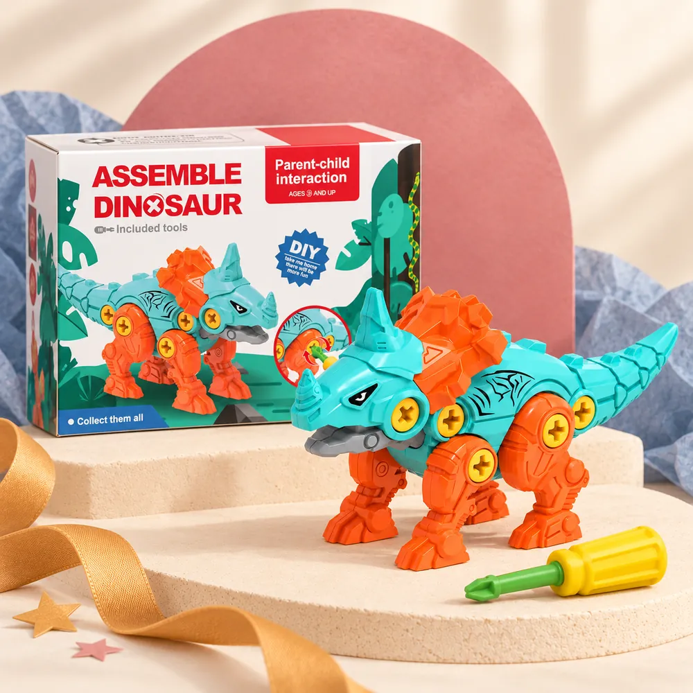The teal and orange centrosaurus with a spiked frill, beside its box and screwdriver