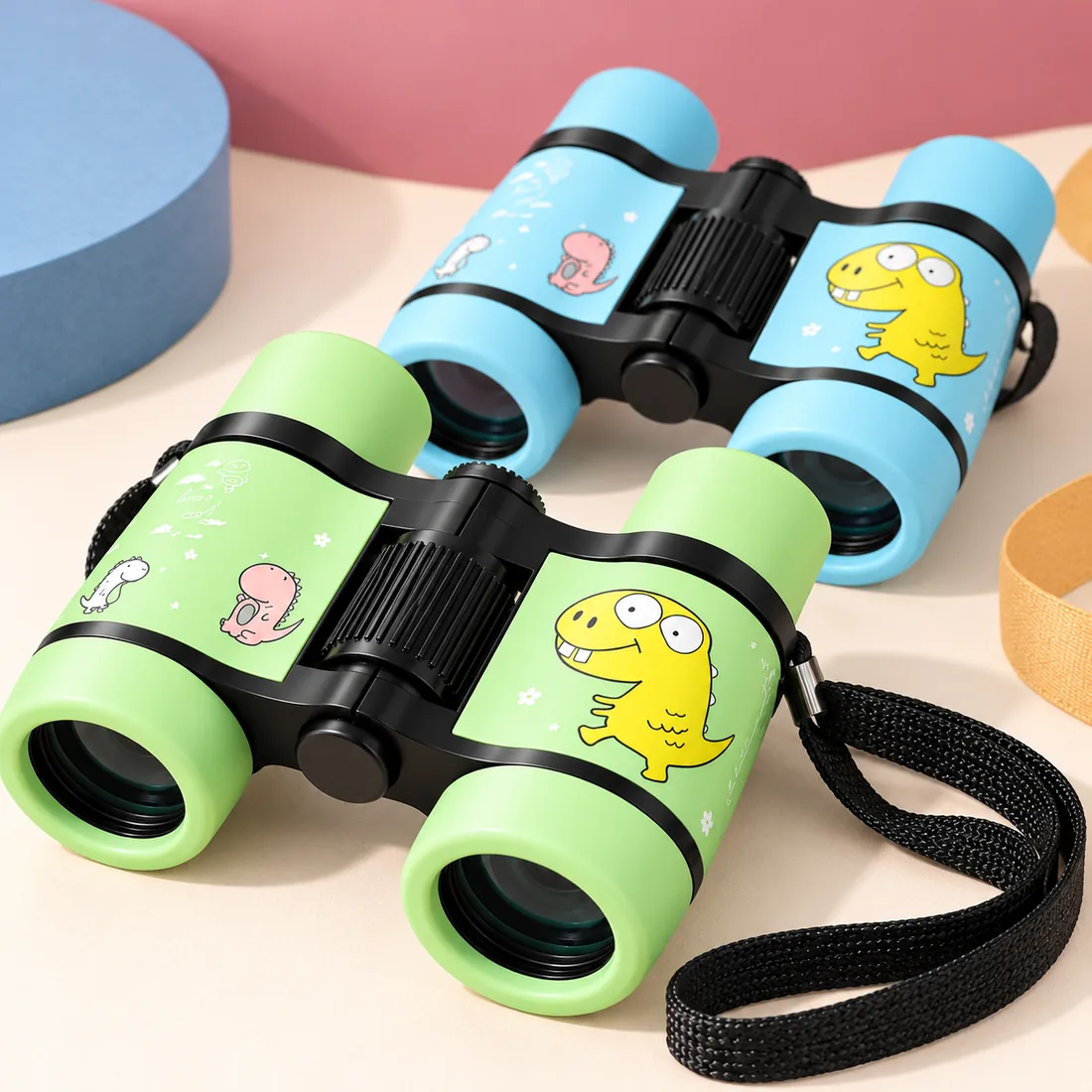 The green and blue pairs stacked together showing the cartoon dinosaur print