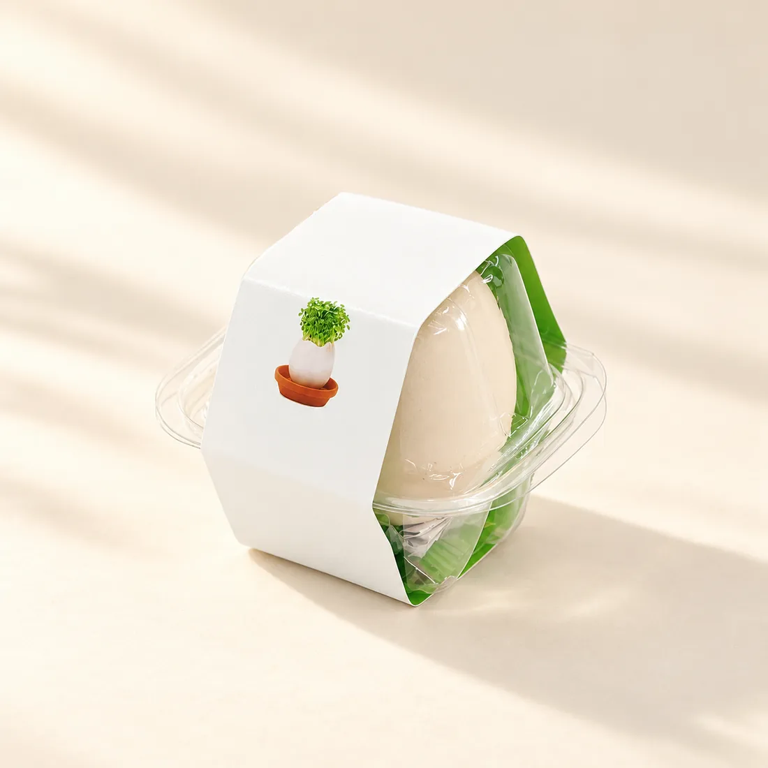A single planter with a green base