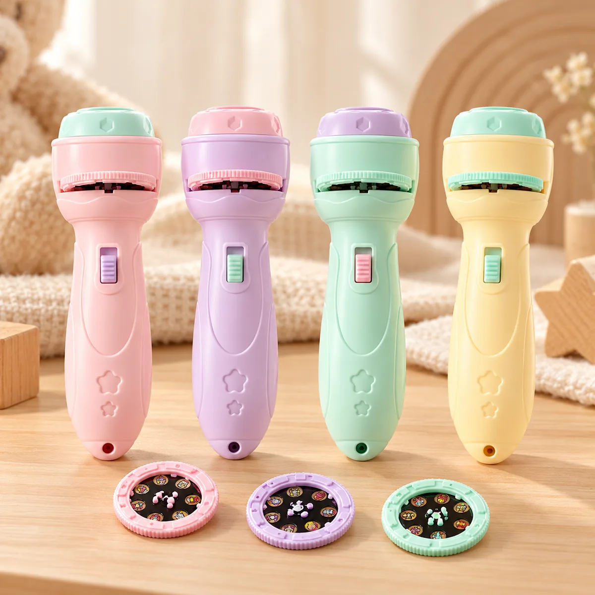 All four body colours lined up - pink, lilac, mint and cream - with three discs in front