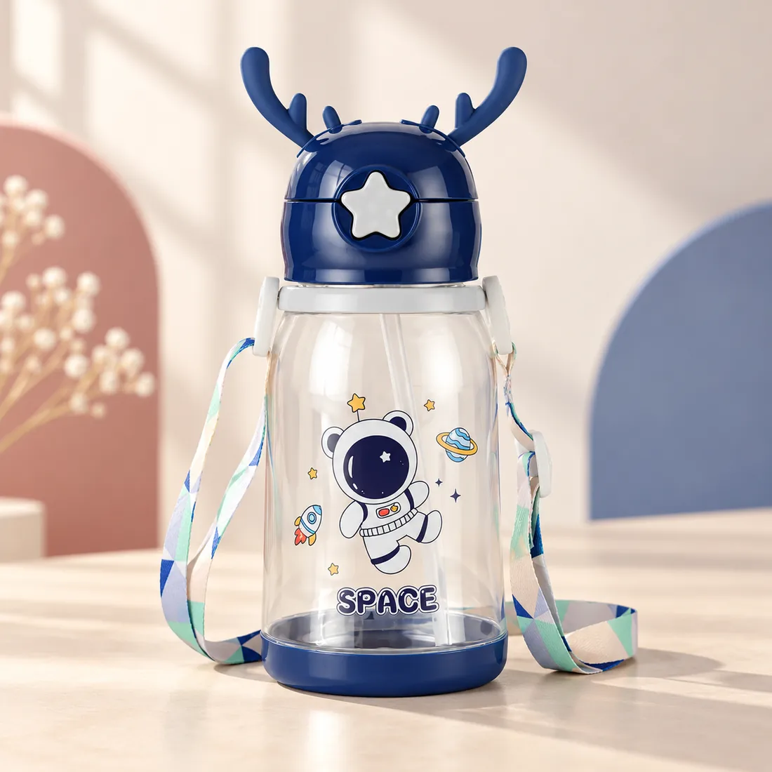 The navy bottle with a floating astronaut print