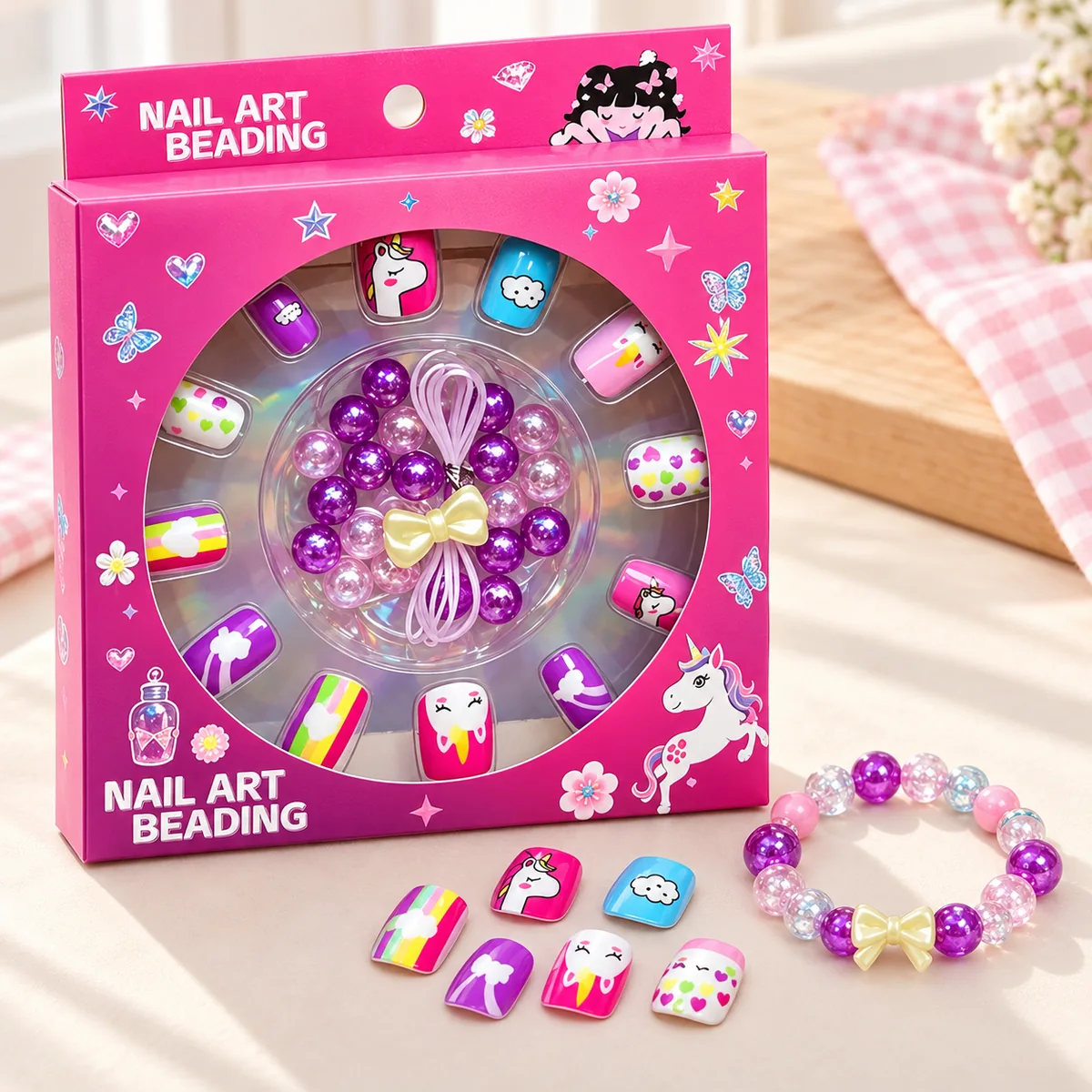 The pink box with its window showing the nails and beads inside
