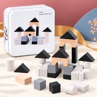 A small castle built from black, grey and beech blocks
