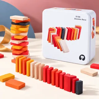 A stacked tower and a curving line of red and orange dominoes